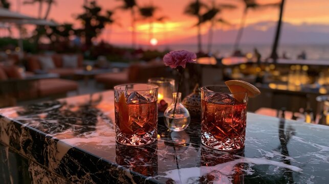 Elegant Glasses with Sunset Over a Serene Resort Background