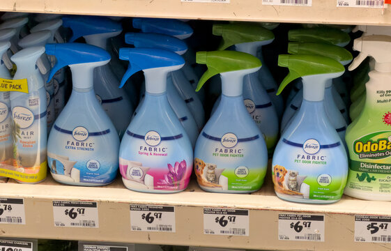 Febreze Fabric Refresher Spray Bottles on Retail Store Shelf
