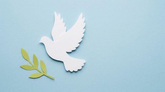White paper cut dove bird flying with green olive branch on light blue background, representing international peace and harmony, ideal for greeting cards and religious or spiritual concept designs