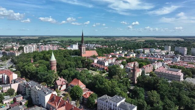 Stargard city church to tower apartments Poland slide 2. Northern Poland in 8th century. Historical stronghold, defensive walls, gates towers. WW II POW camp controlled by Germany. Brick church.