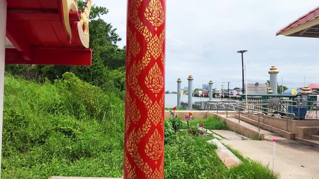 Red Thai Pillar with Gold Pattern at Koh Kret Pier