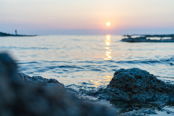 Obraz premium Sunset and Twilight Coastal Scenery by the Sea