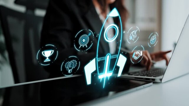 Business professional working on laptop with rocket launch concept and digital icons representing growth, innovation, and success in a modern office environment Sigmoid