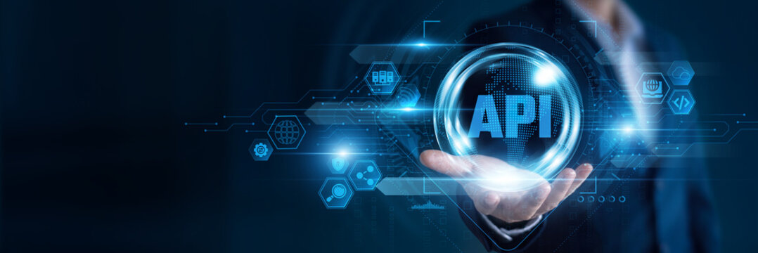 Businessman hand hold API and global networking data, integrating software platforms, enabling seamless connectivity, supporting cloud applications, improving automation.