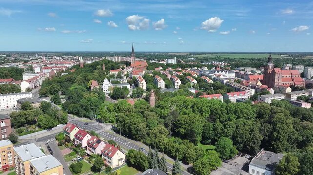 Stargard Poland city church square apartments 1. Northern Poland in 8th century. Historical stronghold, defensive walls, gates towers. WW II POW camp controlled by Germany. Brick church.