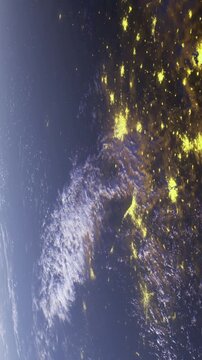 This breathtaking scene captures Earth from a satellites perspective, showing a mosaic of city lights against dark oceans and a colorful atmosphere, creating a stunning blend of nature and humanity.