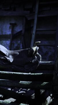 In the soft glow of twilight, a worn leather boot rests on aged wooden beams. The scene speaks of time and stories untold, capturing a moment of quiet stillness and nostalgia.