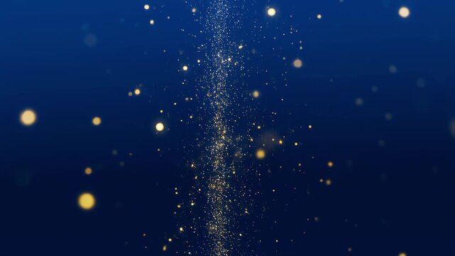 Golden glitter particles cascading gracefully against deep blue sky background with cosmicbackground