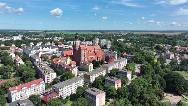 Stargard Poland city church square pull 2. Northern Poland in 8th century. Historical stronghold, defensive walls, gates towers. WW II POW camp controlled by Germany. Brick church.
