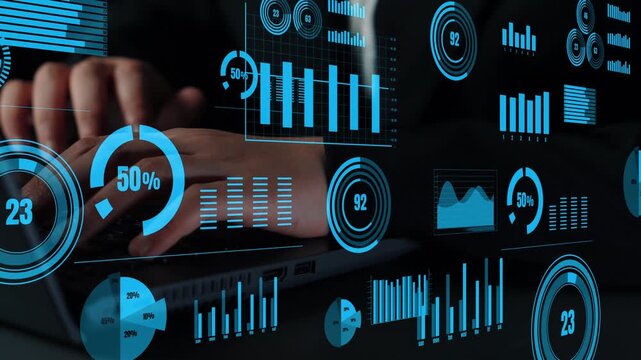 Close-up view showcases hands typing on a laptop while interacting with a dynamic digital visualization interface displaying various charts, graphs, and statistical data insights. Xenic