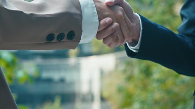 businessman handshake for teamwork of business merger and acquisition.successful negotiate,hand shake,two businessman shake hand with partner to celebration partnership and business deal concept
