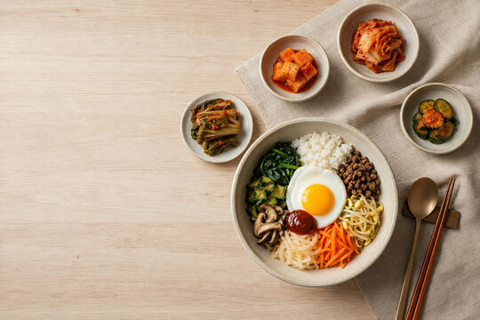 Korean bibimbap with kimchi and copy space