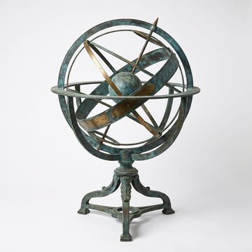 An antique armillary sphere on a pedestal, representing celestial navigation and astronomical study. 