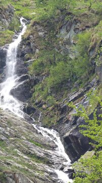 Waterfall Cascading Down Rocky Cliff Near Lago della Rovina