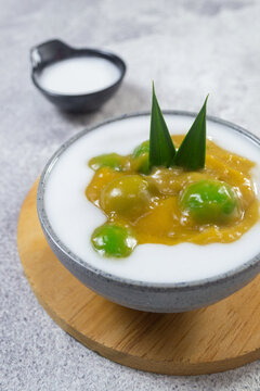 Indonesian traditional javanese sweet dessert Bubur Candil in a ceramic bowl garnished with pandan leaf