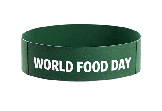 Green wristband with bold white text celebrating world food day awareness campaign isolated