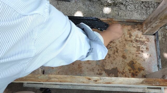 Painting Rusty Metal Sheet with Black Paint