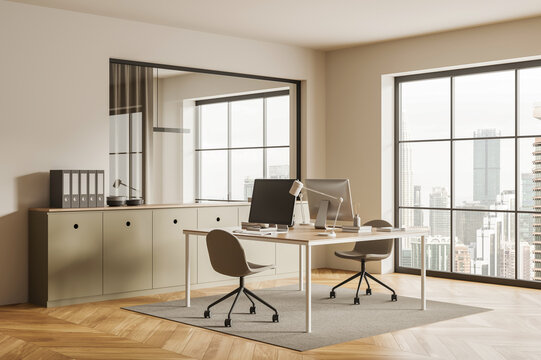 Modern dual workstation office with monitors, chairs, and city views in a warm minimalist style on a neutral interior background; 3D Rendering