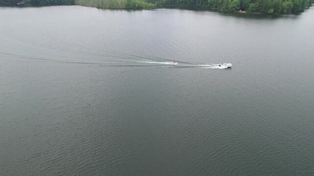 Waterski Aerial of Eagle River Wisconsin Northwoods in the summer time.  Tall pines and the chain of lakes.