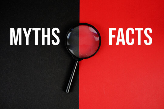 Myths vs Facts text with magnifying glass on black and red background