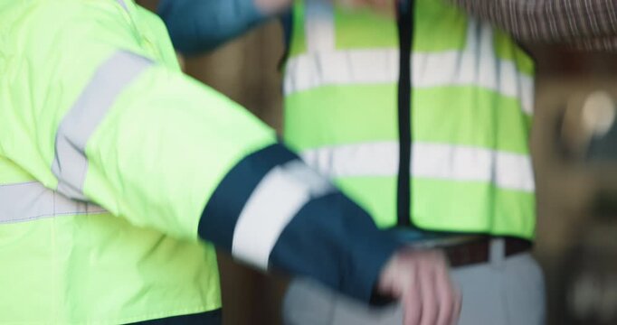 People, team and warehouse with hands together for meeting, supply chain or collaboration. Group, contractor or employees piling with stack in storage depot for shipping, mission or service delivery