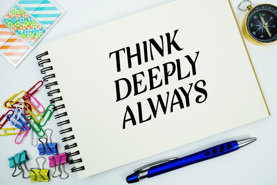 Think Deeply Always text message written on notepad with stationery flat lay on white background