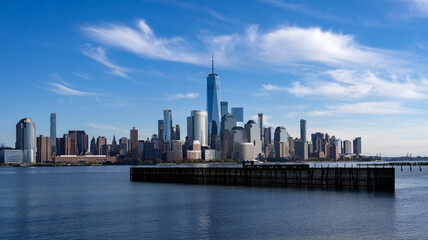 Obraz premium New York cityscape with Lower Manhattan. New York harbor and skyline. New York City waterfront with NYC. New York skyscrapers near downtown.