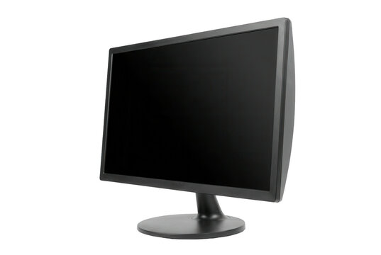 Black computer monitor with blank screen isolated on dark background