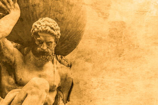 Statue of the Greek God Atlas holding the globe on his shoulders.  On a sepia grunge textured background backdrop.