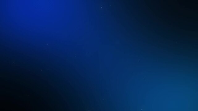 Abstract blue gradient background with floating particles. Deep ocean bokeh light effect.