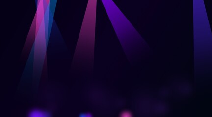 Obraz premium Bright purple and blue stage lights shining down in a dark room for a concert or performance event