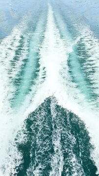 Moving yacht at the ocean with water splashes. Ocean sea water wave reflections. Motor boat in the sea	