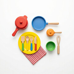 Colorful toy kitchen utensils on checkered napkin background 