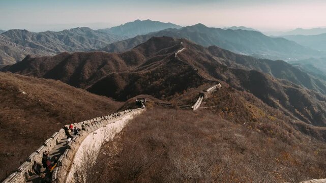 Majestic Great Wall of China Stretching Over Mountainous Terrain