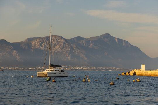 sailboats, New Harbor, Hermanus, South Africa at sunset