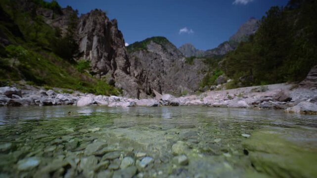 Clear mountain river water flowing towards the camera. Andreis, Friulian Dolomites, Italy, low angle