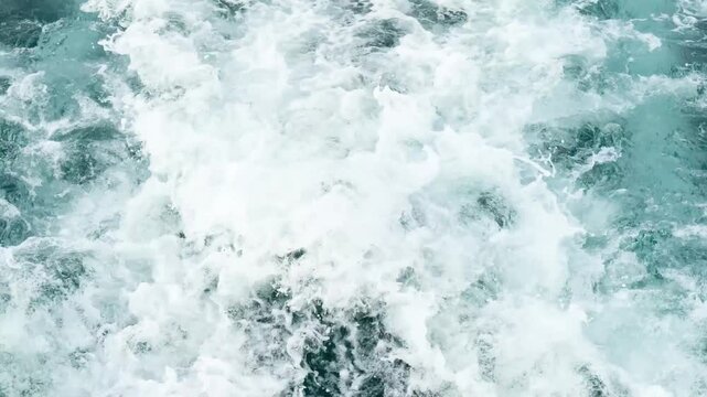 Moving yacht at the ocean with water splashes. Ocean sea water wave reflections. Motor boat in the sea	