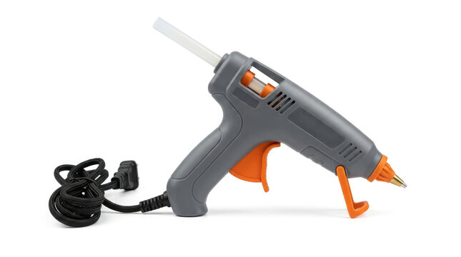 Compact Gray Hot Glue Gun with Glue Stick Isolated on White Background DIY Crafting and Repair Equipment