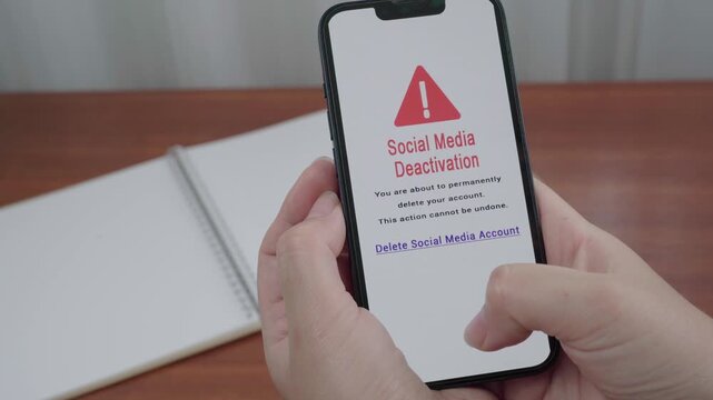 User pauses over an AI powered social media deactivation warning that confirms permanent account deletion on a mobile screen.