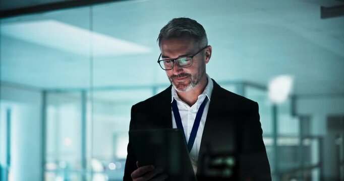 Happy, window and business man on tablet at night for research, investment portfolio and planning. Corporate office, finance and mature person on tech for financial review, budget and risk assessment