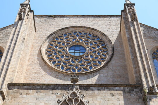 Rose window in the facade of the Basilica of Santa Maria del Mar in Barcelona, Spain  