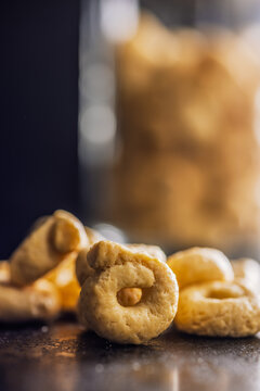 Golden Butter Cookie Rings Close-Up Stack Texture Macro Shot For Snack And Dessert Use