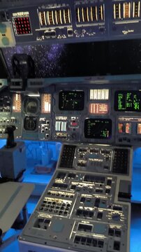 Control panel switches and screens inside a spaceship