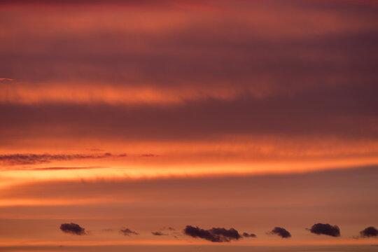 bright red clouds on a sunset sky