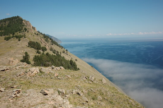 Cliffs above Lake Baikal and clouds