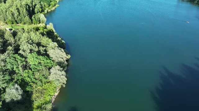Lake forest blue water Krakow Poland slide. Southern Poland. Summer season recreation, trails, rivers lakes. Pine, oak, birch, beech forests, farm agriculture. Water and sandy beach. fun boating.