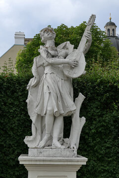 Allegorical statue of Music playing a lute in the Belvedere Gardens, Vienna, Austria. 