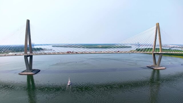Arthur Ravenel Jr Bridge and sailboat in Charleston