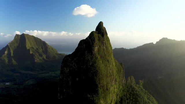 Green mountains of Moorea Island at golden hour