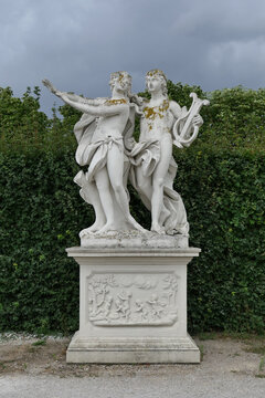 Allegorical statues with lyre in the Upper Belvedere Gardens, Vienna, Austria. 